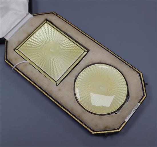 An Adie Bros silver and yellow guilloche enamel cigarette case and compact set, Birmingham 1936, original retailers case